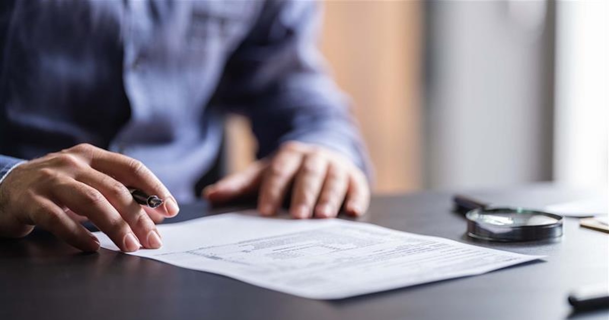Person signing a contract