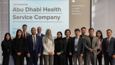 Officials from Lunit and SEHA pose during the signing of a collaboration agreement