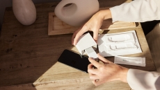 
  A person unboxing a Cue test. 
