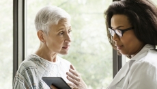 Healthcare professional consulting with patient