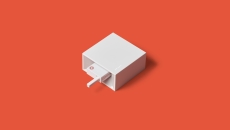
  Cue Health reader with red background

