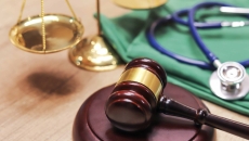 
  A gavel and a stethoscope. 
