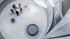 Employees gathering in an atrium