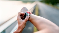 
  A close-up of a person wearing a smartwatch.
