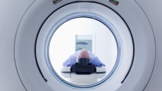 
  Person in a diagnostic imaging machine 
