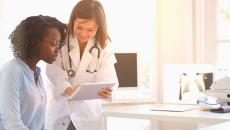 Healthcare provider in the clinical setting with a patient