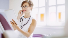 Healthcare provider holding a chart