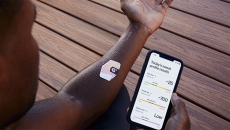 A product shot of the Gx Sweat Patch and Gx App