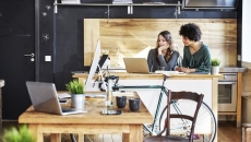 Two workers at a desk