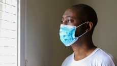 Person wears a mask