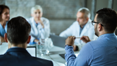 Professional staff in conference