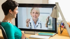 Patient having a telemedicine conference with a healthcare professional