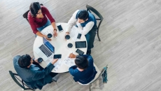 People having a business meeting at a roundtable
