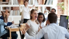 A group of teenagers gathered in a room