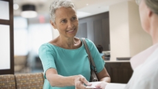 Patient discussing prescription with healthcare professional