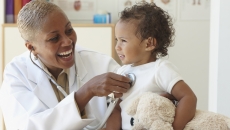 Healthcare professional with infant