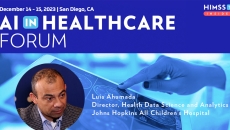 Luis Ahumada at Johns Hopkins All Children's Hospital_ Doctor looking at brain scan on tablet photo by katleho Seisa_Getty Images