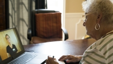 Healthcare professional consulting with a patient virtually