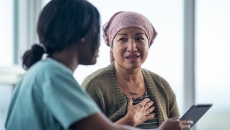 Healthcare professional consulting with a patient