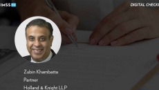 Zubin Khambatta at Holland &amp; Knight_Patient with clipboard Photo by megaflopp/iStock/Getty Images Plus