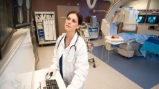 A doctor reviewing a patient's scan