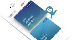 An image of a smartphone displaying the Wysa app, including options to start a daily check-in or chat with a coach.