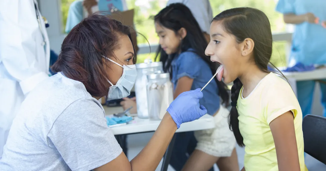 Healthcare provider examining a patient