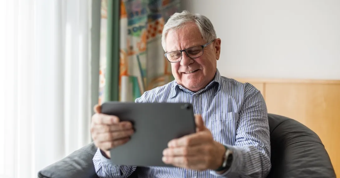 Man using a tablet PC Man using a tablet PC