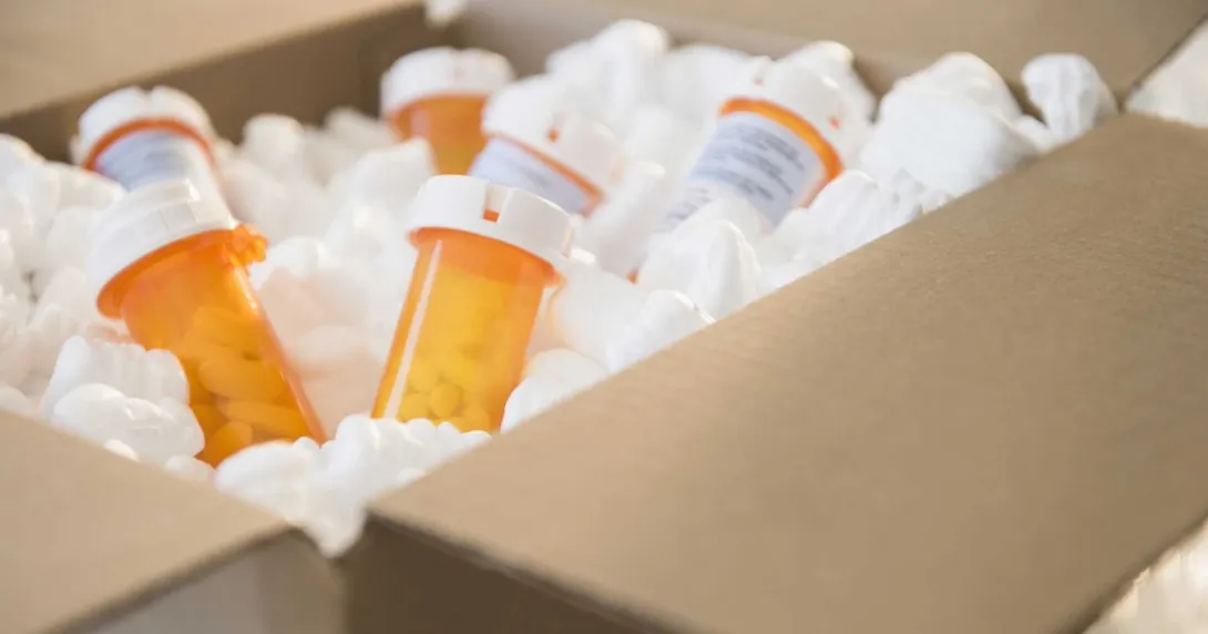 Prescription drug bottles in a box Prescription drug bottles in a box