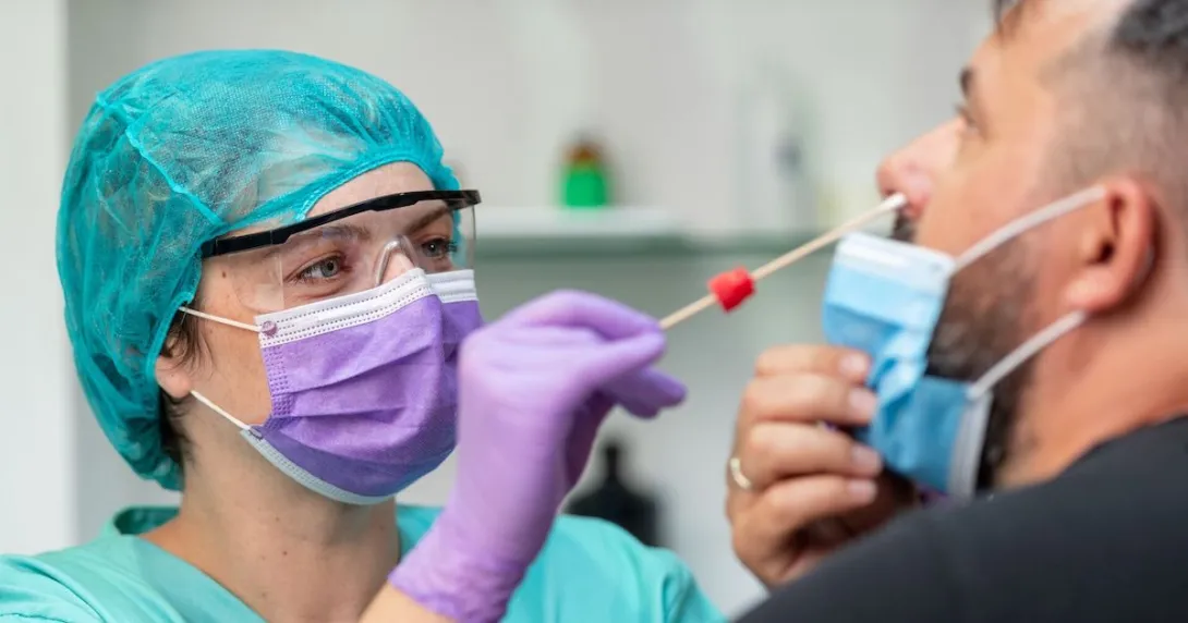 A provider conducting a COVID-19 test.
A provider conducting a COVID-19 test.