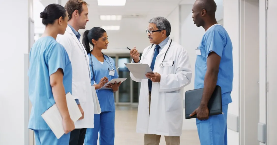 Healthcare professionals in a consultation Healthcare professionals in a consultation
