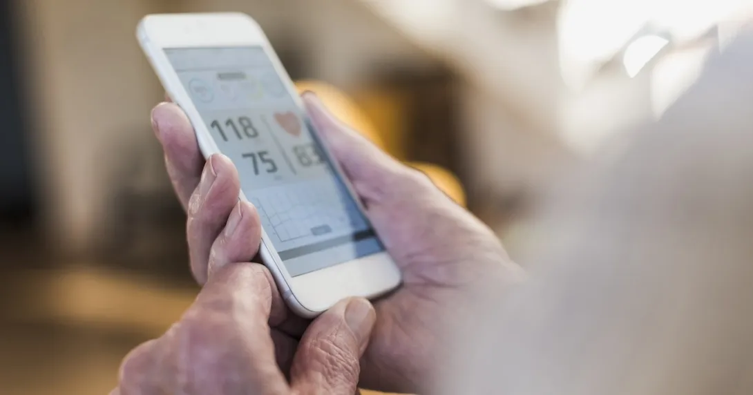 Person looking at smartphone health information Person looking at smartphone health information