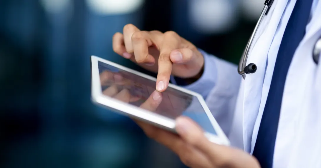 Healthcare provider on a tablet
Healthcare provider on a tablet