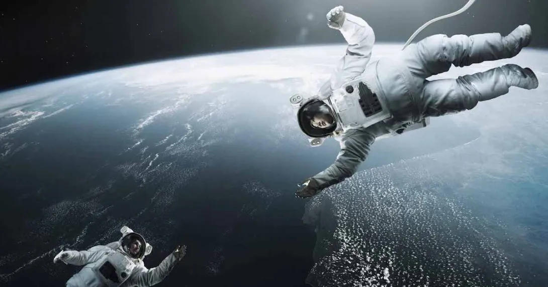 Photo of astronauts in space Photo of astronauts in space