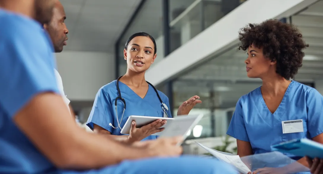 Healthcare providers sitting in a circle Healthcare providers sitting in a circle