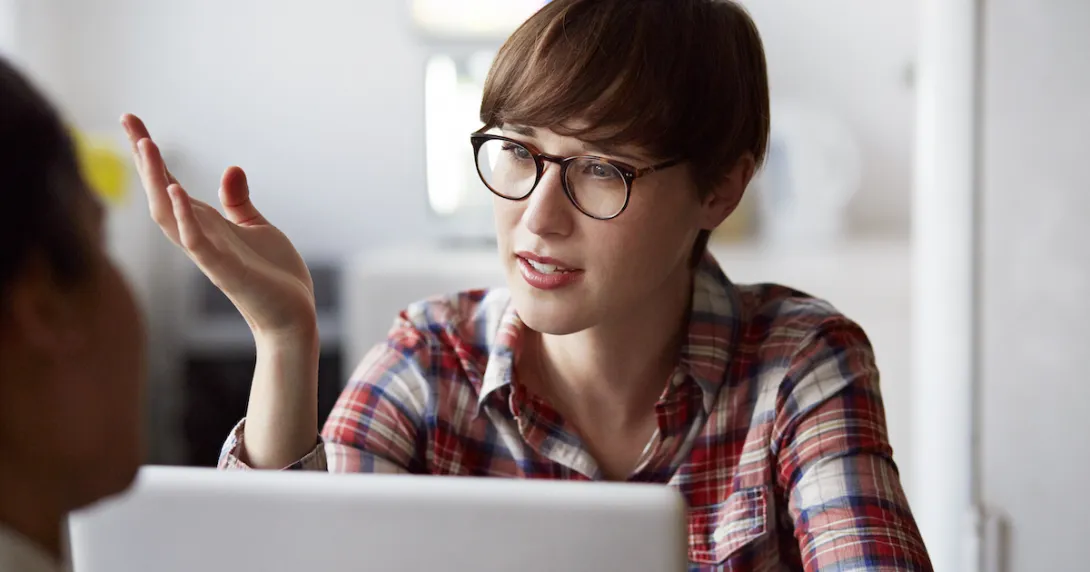 Person at a computer talking
Person at a computer talking