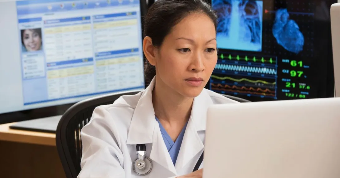 Healthcare provider sitting at a computer
Healthcare provider sitting at a computer