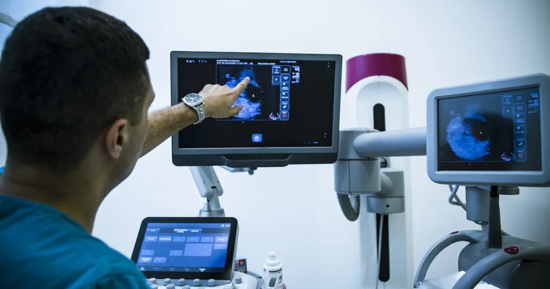 Technician looking at x-ray Technician looking at x-ray