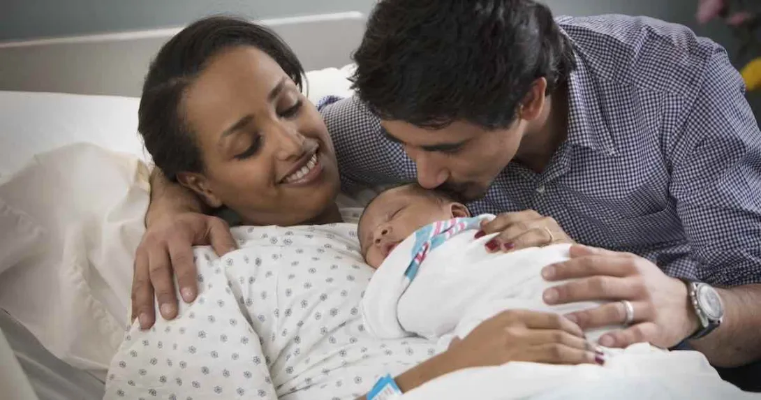 Parents with newborn baby Parents with newborn baby