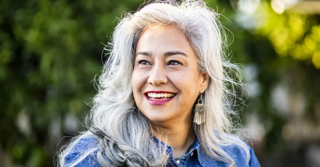 Person with gray hair smiling Person with gray hair smiling