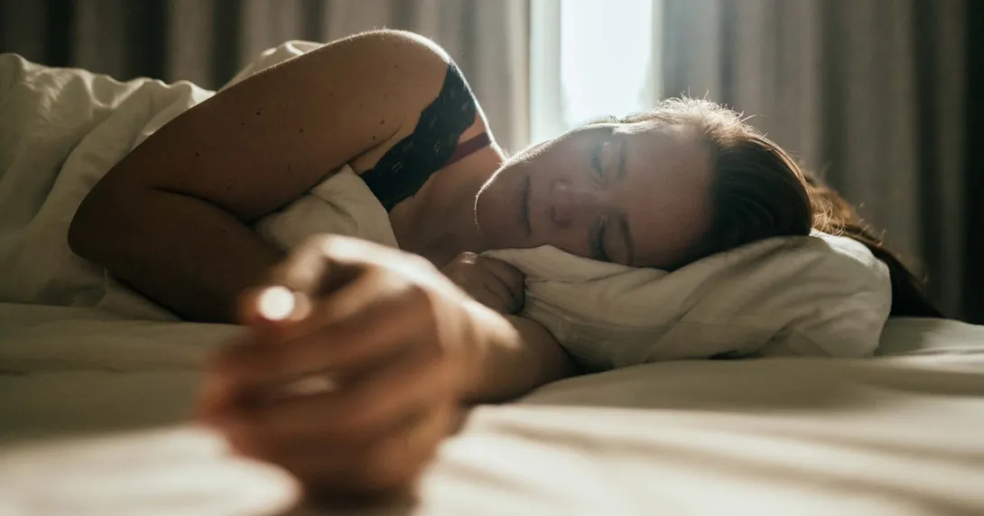 Someone sleeping in a bed Someone sleeping in a bed