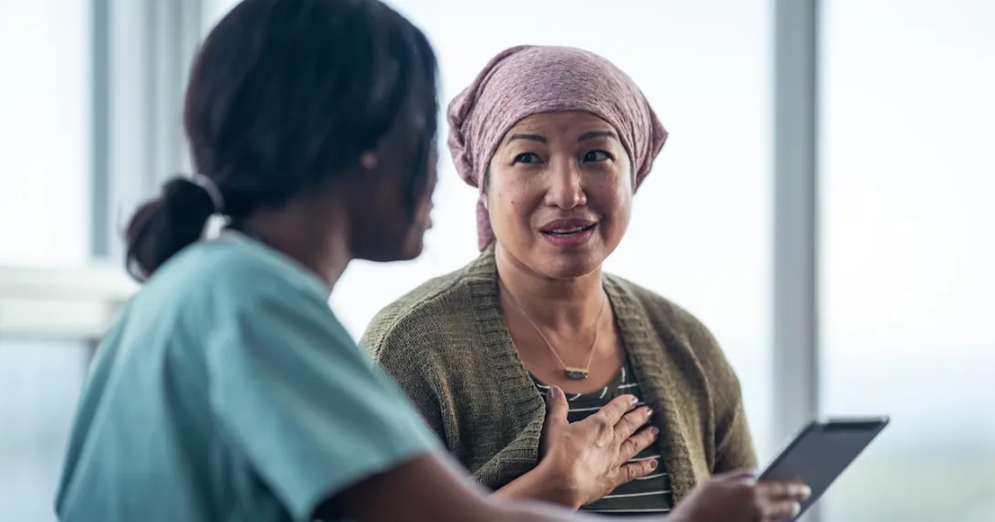 Healthcare professional consulting with a patient Healthcare professional consulting with a patient