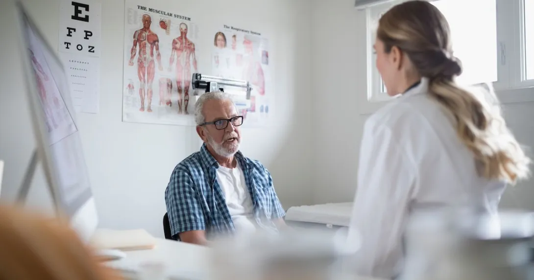 Healthcare professional consulting with patient Healthcare professional consulting with patient