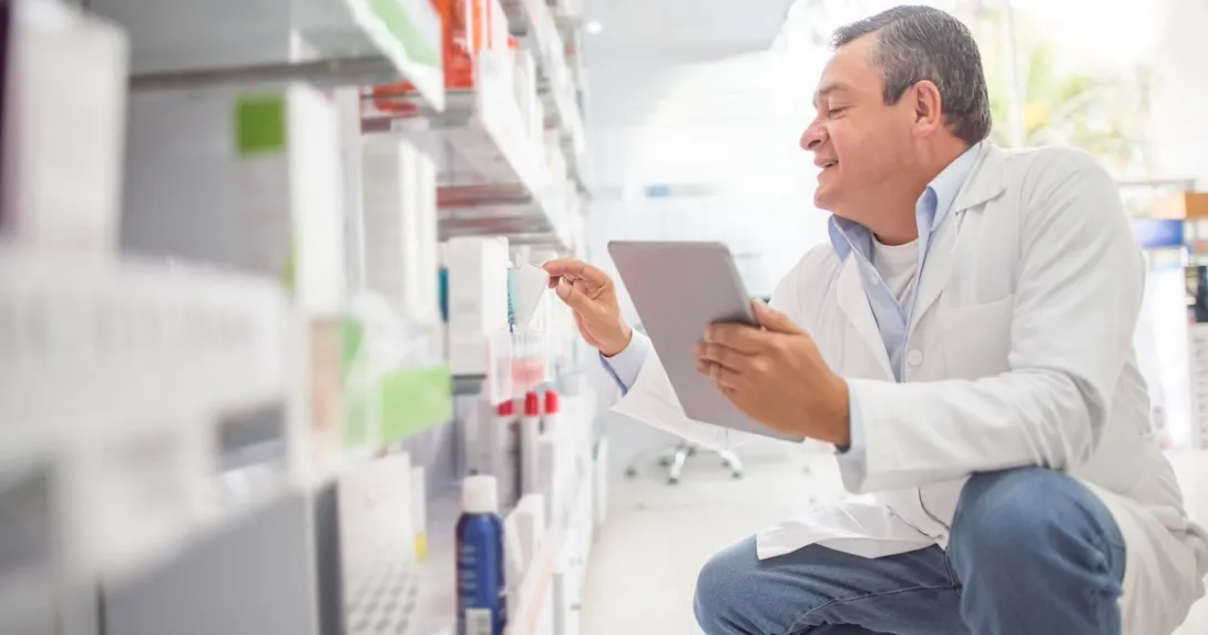 Pharmacist conducting inventory Pharmacist conducting inventory
