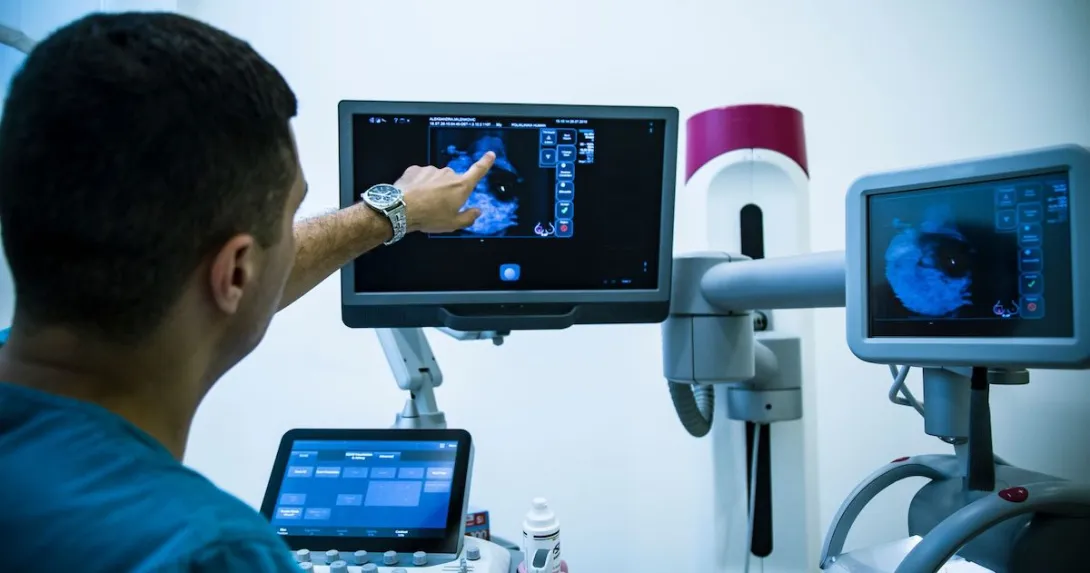 A doctor looking at a mammogram.
A doctor looking at a mammogram.