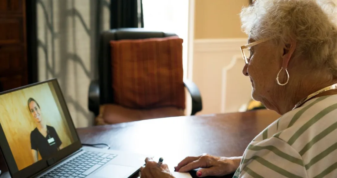 A person talking to a provider via a video chat on a laptop
A person talking to a provider via a video chat on a laptop