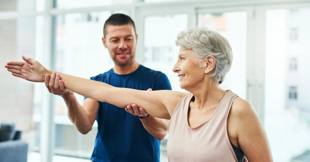 Caregiver exercising a care taker
Caregiver exercising a care taker
