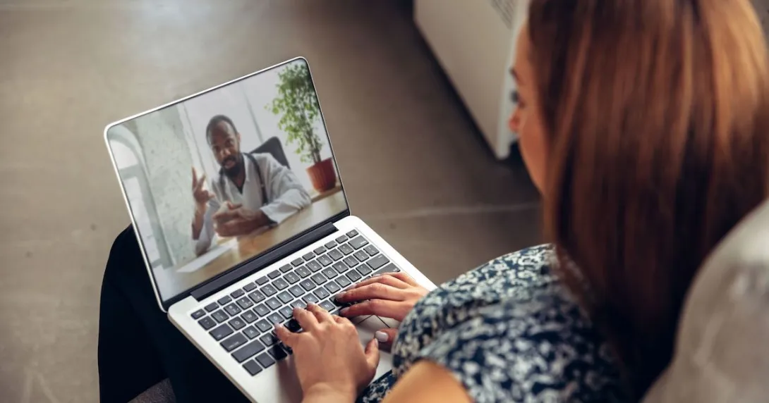 Person on a telehealth call on their laptop
Person on a telehealth call on their laptop