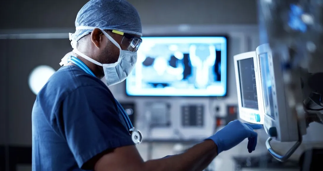 Healthcare provider looking at screens Healthcare provider looking at screens
