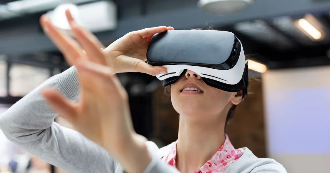 A person using virtual reality glasses A person using virtual reality glasses